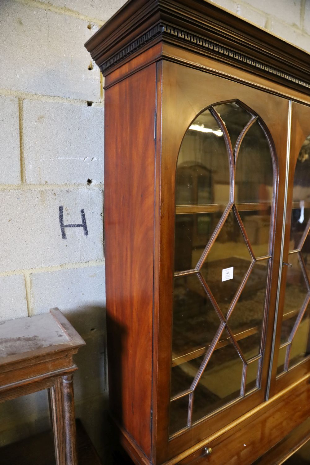 A mahogany bookcase / cupboard, width 90cm depth 36cm height 195cm